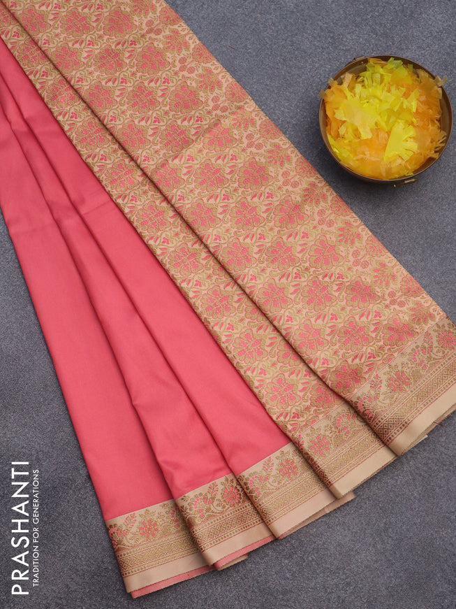 Semi banarasi katan saree peach pink and sandal with plain body and zari woven border