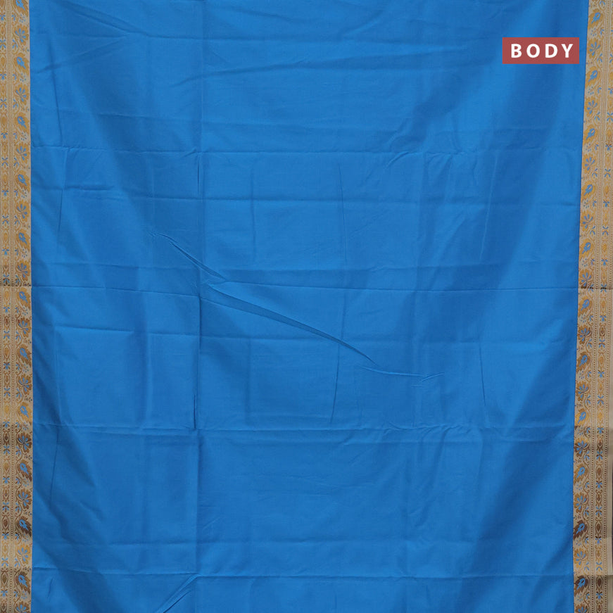 Semi banarasi katan saree cs blue and beige with plain body and zari woven border