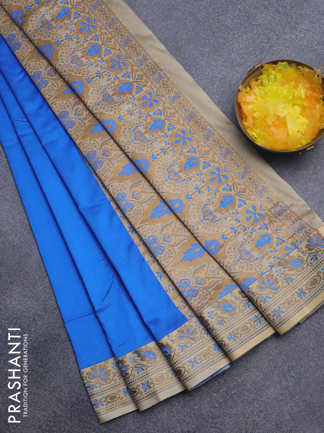 Semi banarasi katan saree blue and beige with plain body and zari woven border