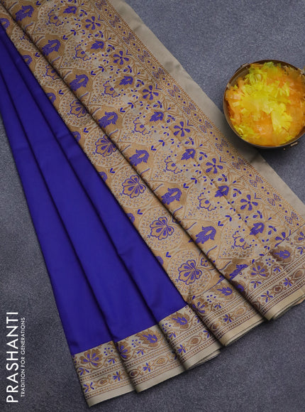 Semi banarasi katan saree blue and beige with plain body and zari woven border