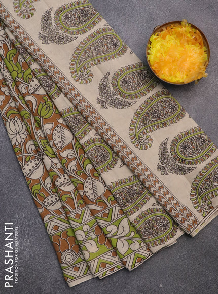 Kalamkari cotton saree dark mustard and light green with allover prints and printed border