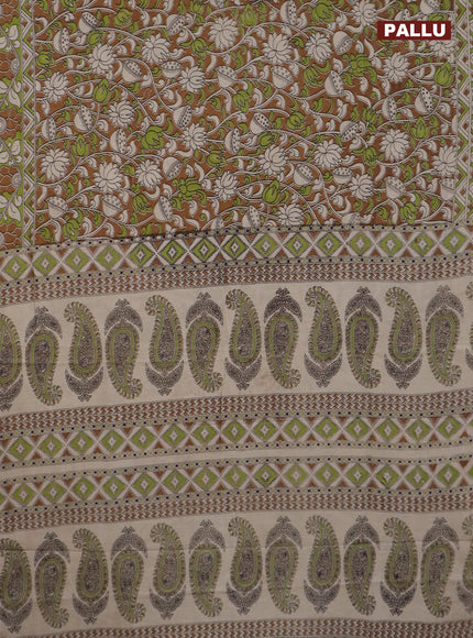 Kalamkari cotton saree dark mustard and light green with allover prints and printed border