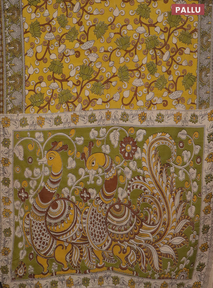 Kalamkari cotton saree mustard yellow and mehendi green with allover prints and printed border