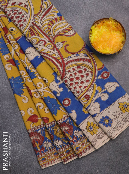 Kalamkari cotton saree mustard yellow and blue with allover prints and printed border