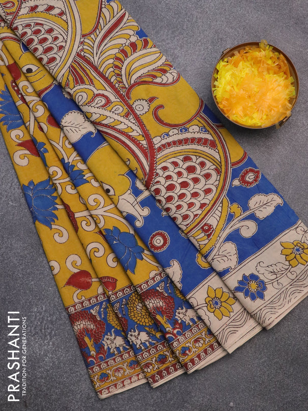 Kalamkari cotton saree mustard yellow and blue with allover prints and printed border