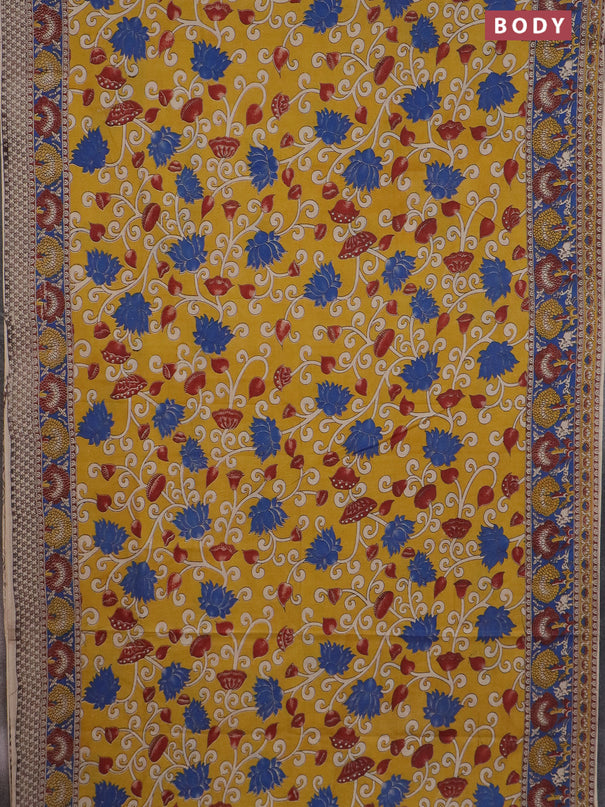 Kalamkari cotton saree mustard yellow and blue with allover prints and printed border