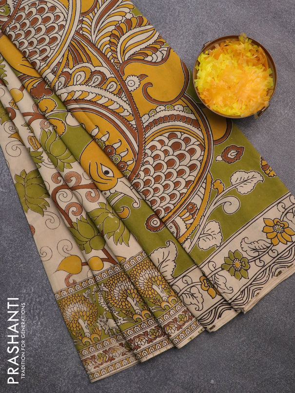 Kalamkari cotton saree cream and mehendi green with allover prints and printed border