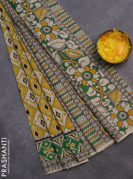 Kalamkari cotton saree yellow and green with allover ikat prints and printed border