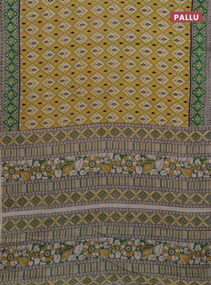 Kalamkari cotton saree yellow and green with allover ikat prints and printed border