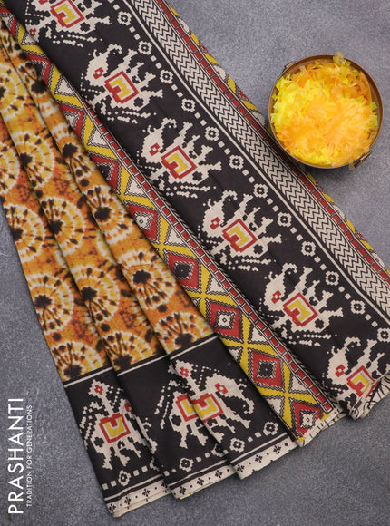 Kalamkari cotton saree dark mustard and black with batik butta prints and printed border