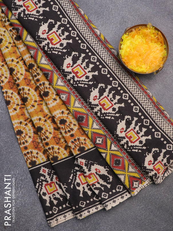 Kalamkari cotton saree dark mustard and black with batik butta prints and printed border