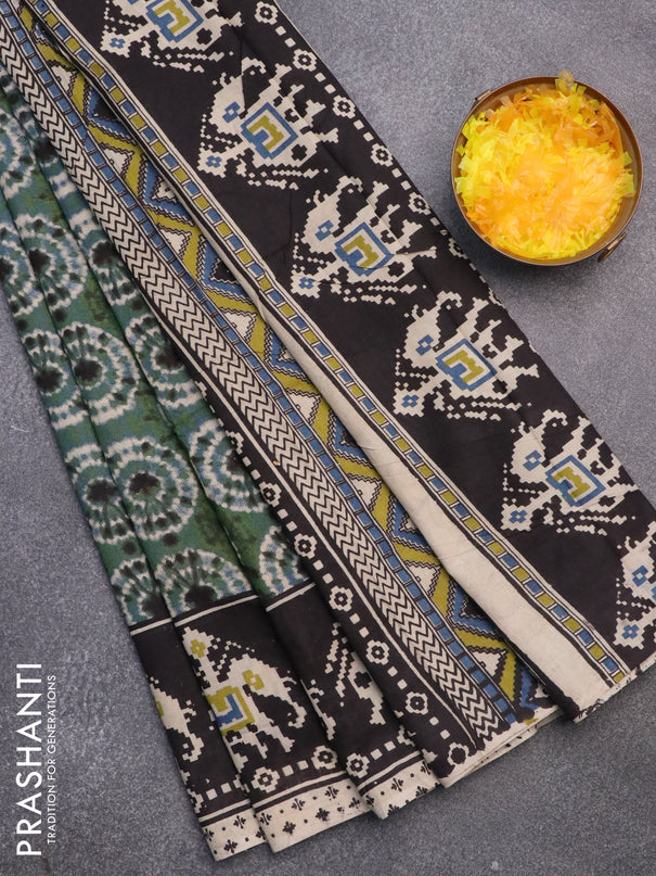 Kalamkari cotton saree green and black with batik butta prints and printed border