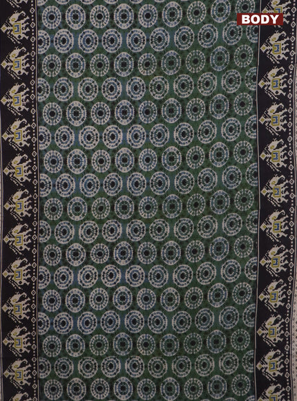 Kalamkari cotton saree green and black with batik butta prints and printed border