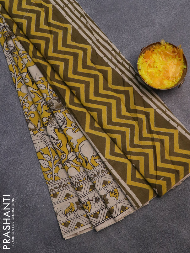 Kalamkari cotton saree yellow and beige with allover prints and printed border