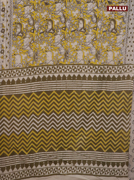 Kalamkari cotton saree yellow and beige with allover prints and printed border