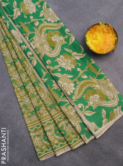 Kalamkari cotton saree mehendi green with allover batik prints and printed border