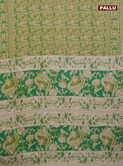 Kalamkari cotton saree mehendi green with allover batik prints and printed border