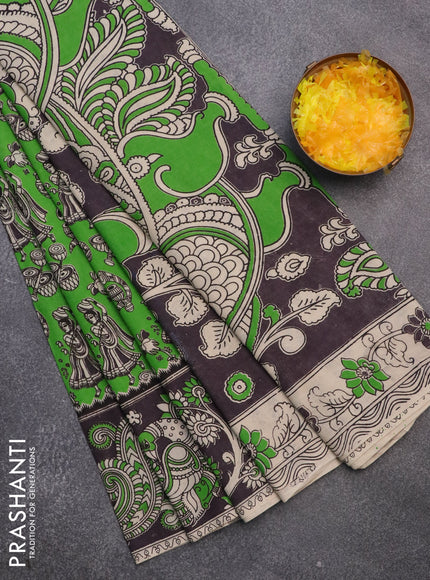 Kalamkari cotton saree parrot green and black with allover prints and printed border