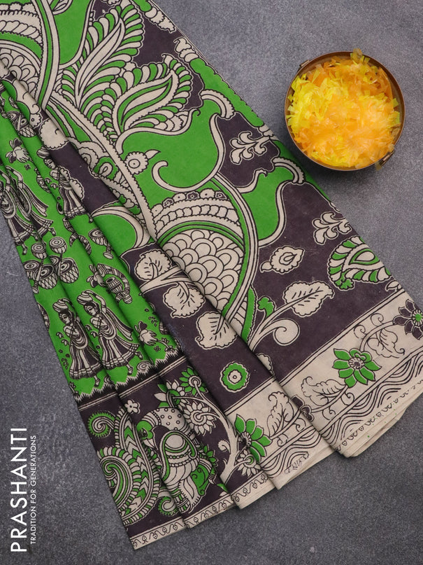 Kalamkari cotton saree parrot green and black with allover prints and printed border