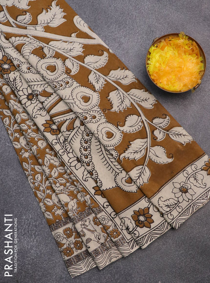 Kalamkari cotton saree mustard and beige with allover prints and printed border