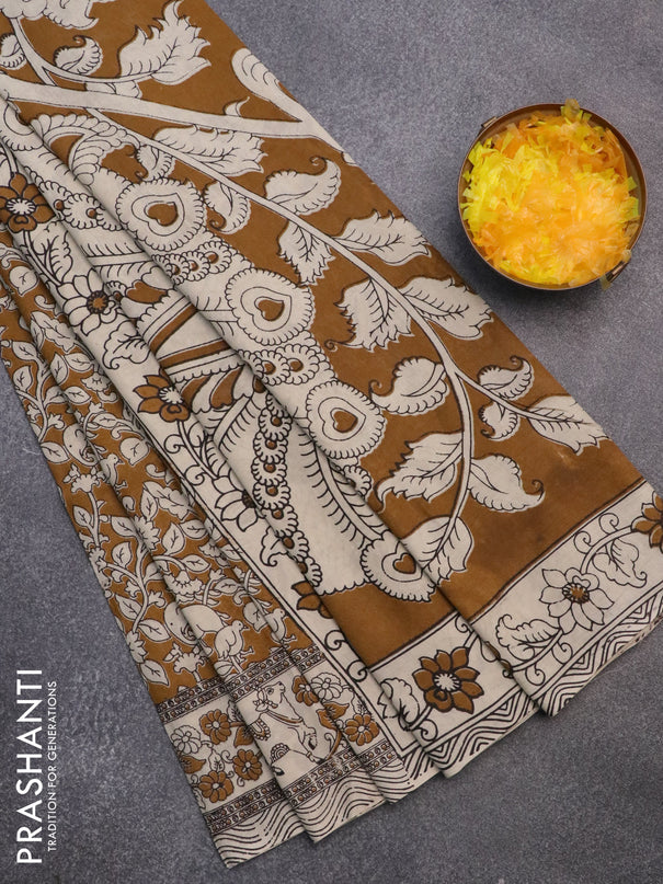 Kalamkari cotton saree mustard and beige with allover prints and printed border