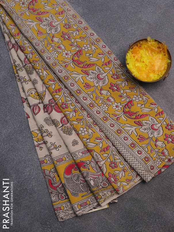 Kalamkari cotton saree beige and yellow with allover prints and printed border