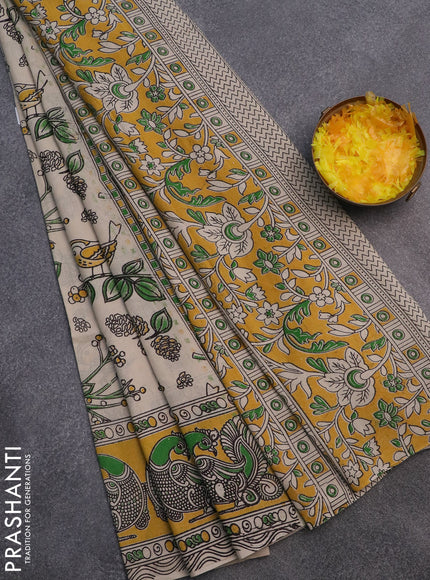 Kalamkari cotton saree beige green and yellow with allover prints and printed border