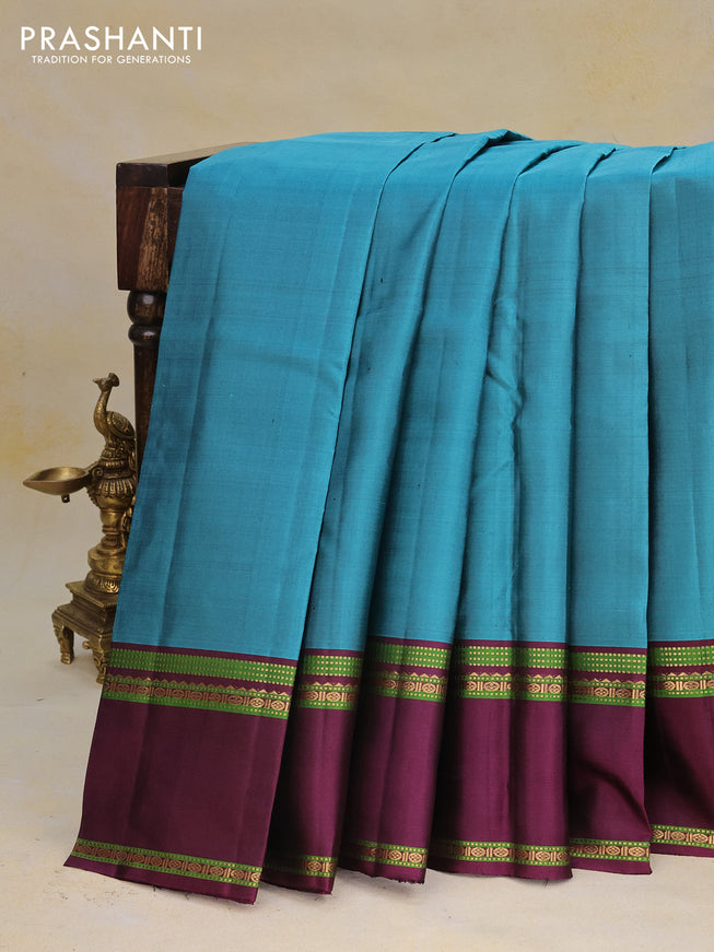 Pure kanchipuram silk saree peacock blue and wine shade with zari woven buttas and rettapet zari woven border