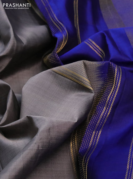 Pure kanchipuram silk saree grey and blue with plain body and rettapet zari woven border