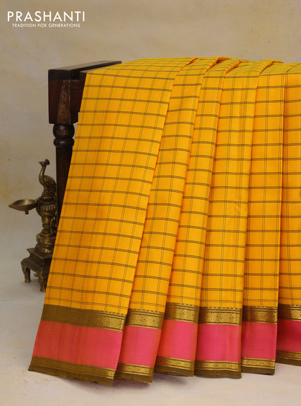 Pure kanchipuram silk saree mango yellow and pink with allover checked pattern and rettapet zari woven border