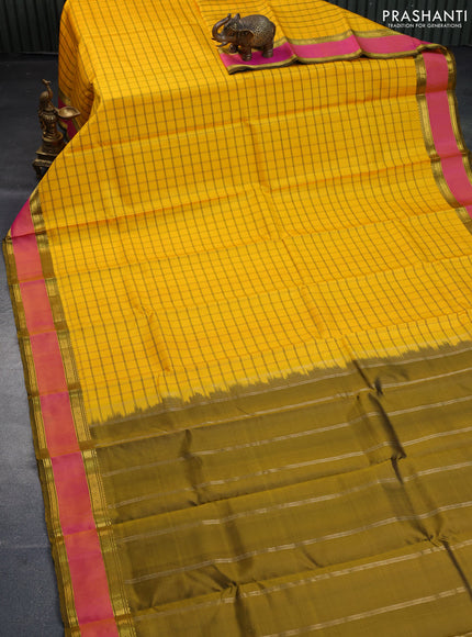 Pure kanchipuram silk saree mango yellow and pink with allover checked pattern and rettapet zari woven border