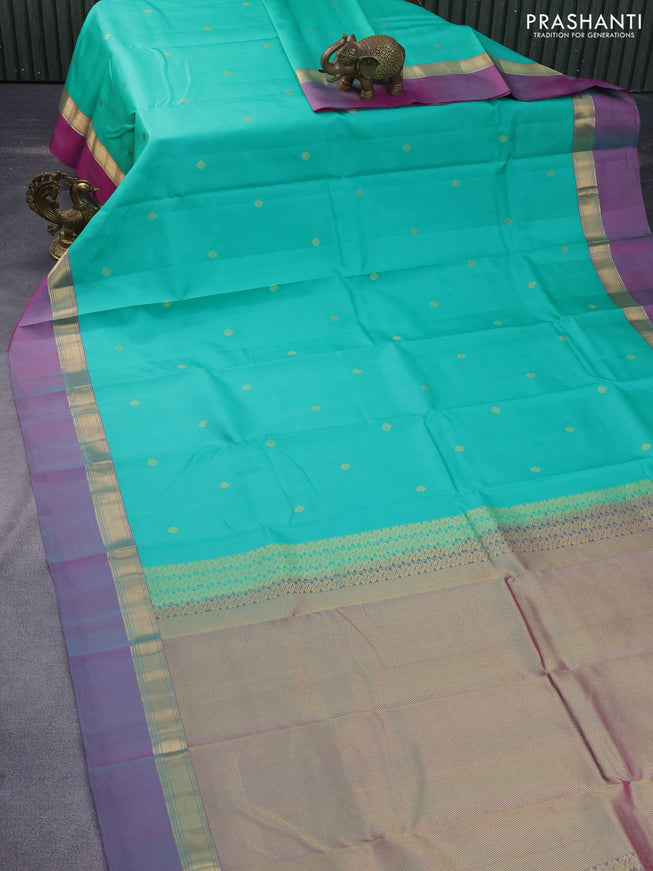 Pure kanchipuram silk saree teal green and pink with zari woven buttas and zari woven simple border