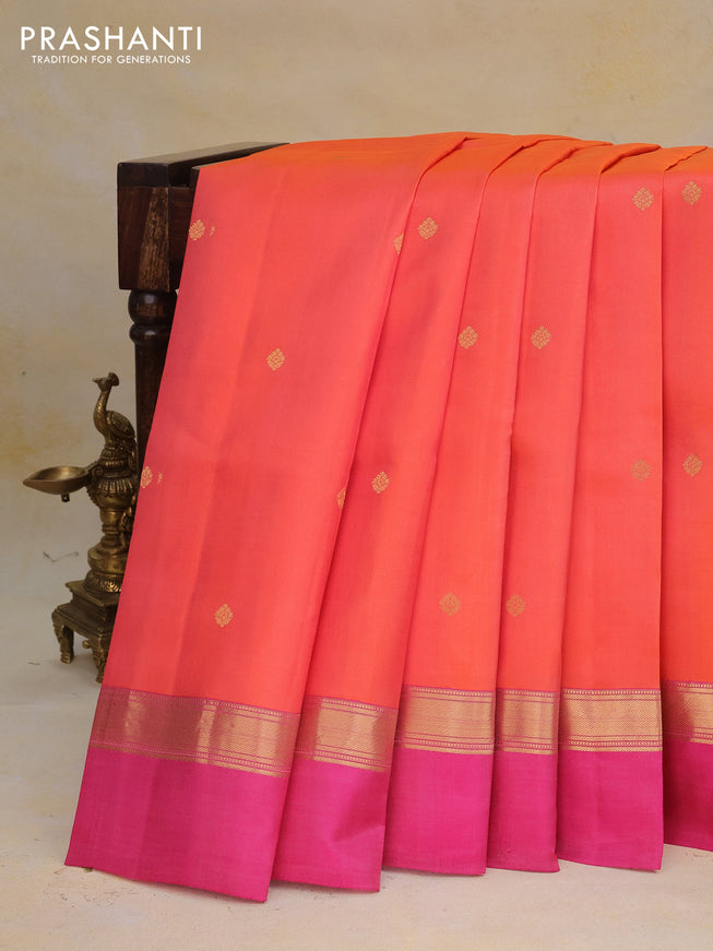 Pure kanchipuram silk saree dual shade of pinkish orange and pink with zari woven buttas and zari woven simple border