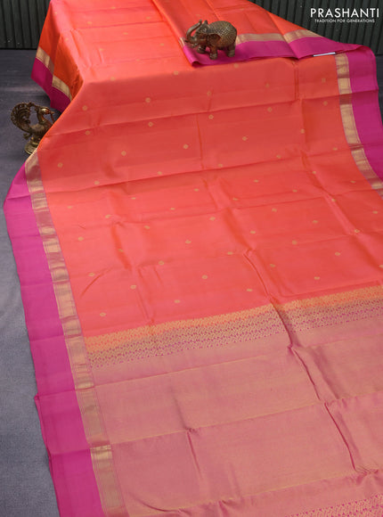 Pure kanchipuram silk saree dual shade of pinkish orange and pink with zari woven buttas and zari woven simple border