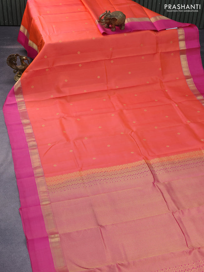 Pure kanchipuram silk saree dual shade of pinkish orange and pink with zari woven buttas and zari woven simple border