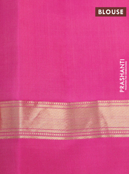 Pure kanchipuram silk saree dual shade of pinkish orange and pink with zari woven buttas and zari woven simple border