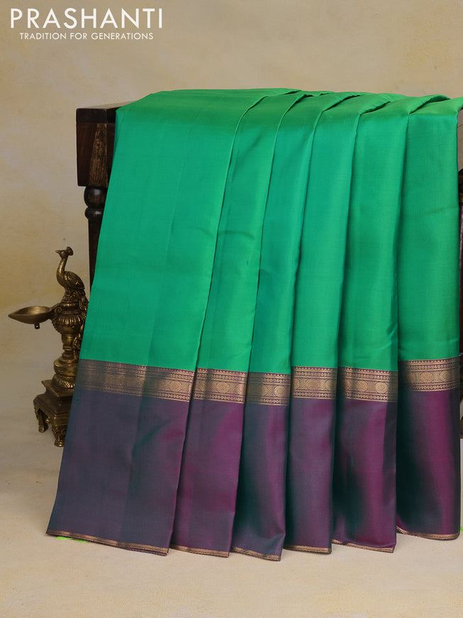 Pure kanchipuram silk saree green with plain body and ganga jamun aborder