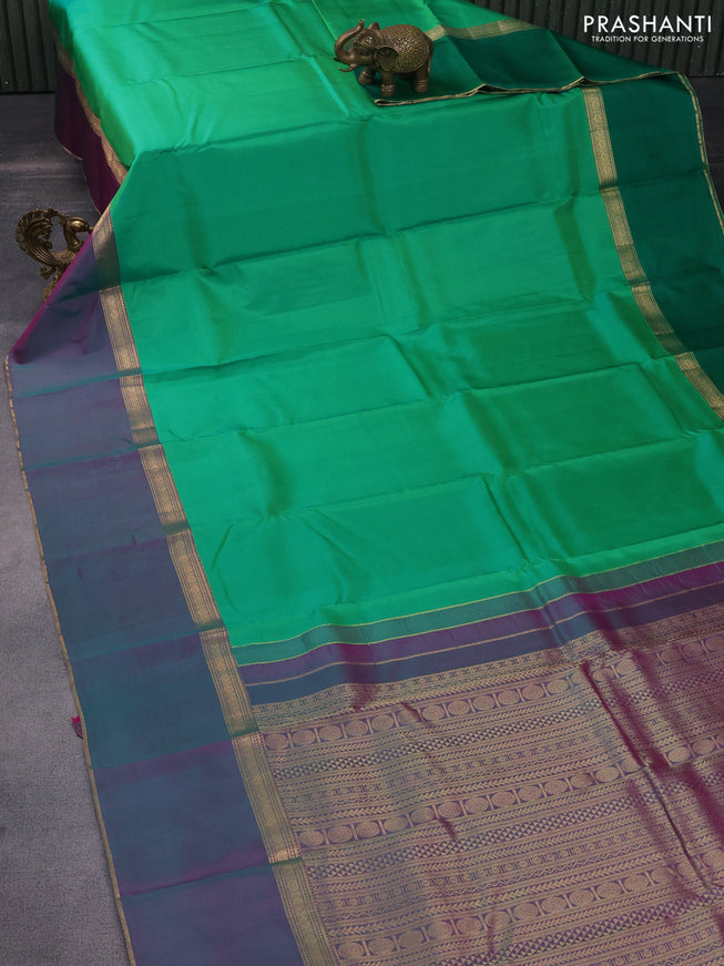 Pure kanchipuram silk saree green with plain body and ganga jamun aborder