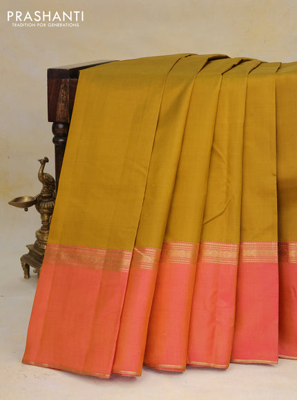 Pure kanchipuram silk saree dark mustard with plain body and ganga jamun aborder