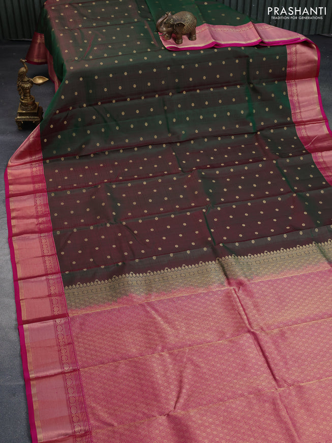 Pure kanchipuram silk saree dual shade of bottle green and pink with allover self emboss & zari buttas and rich zari woven border