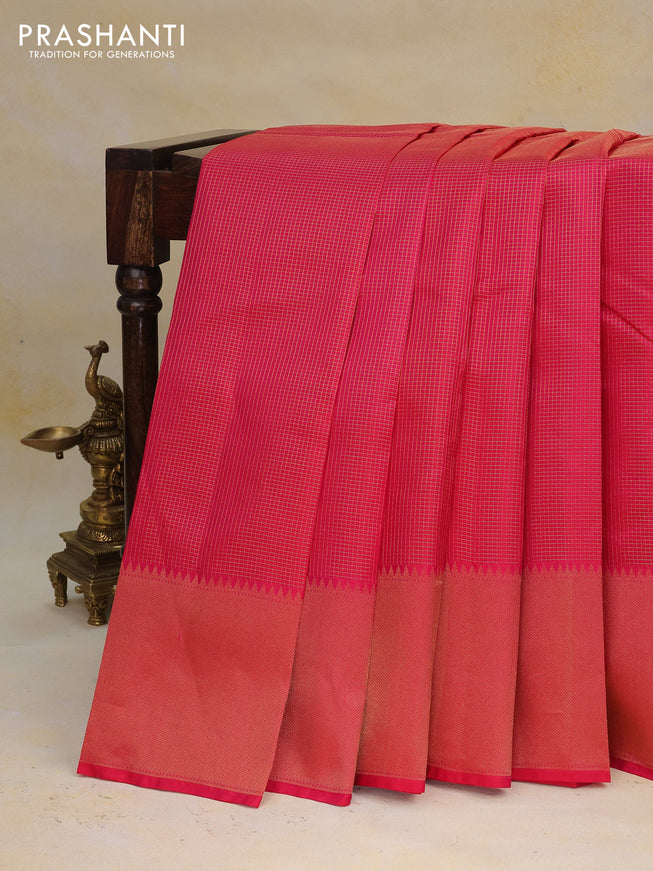 Pure kanchipuram silk saree dual shade of pinkish orange with allover zari woven checked pattern and rich zari woven border