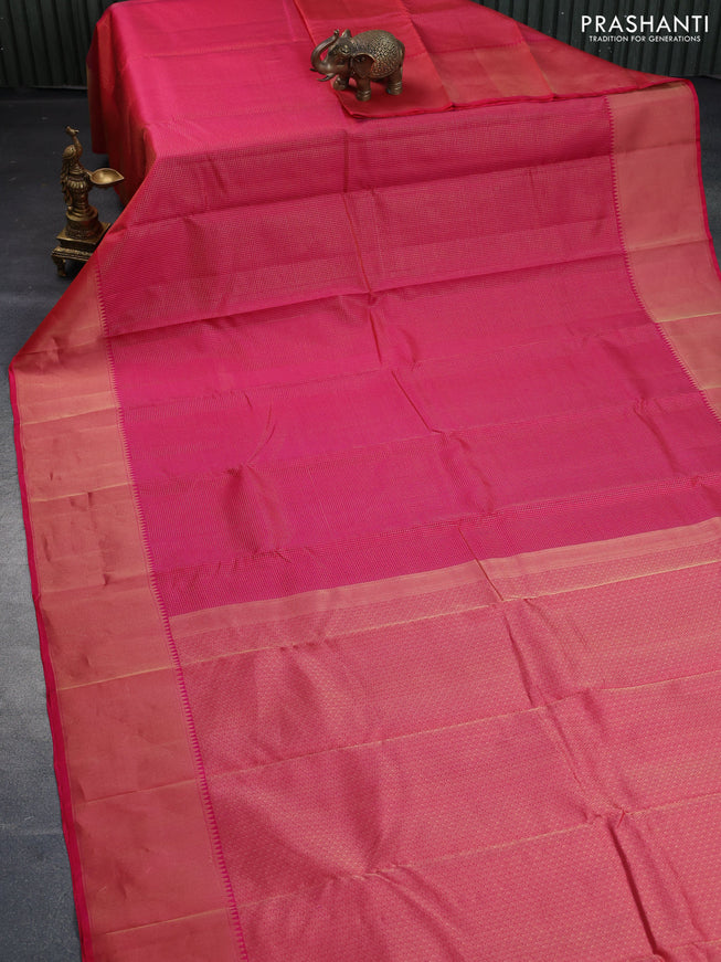 Pure kanchipuram silk saree dual shade of pinkish orange with allover zari woven checked pattern and rich zari woven border