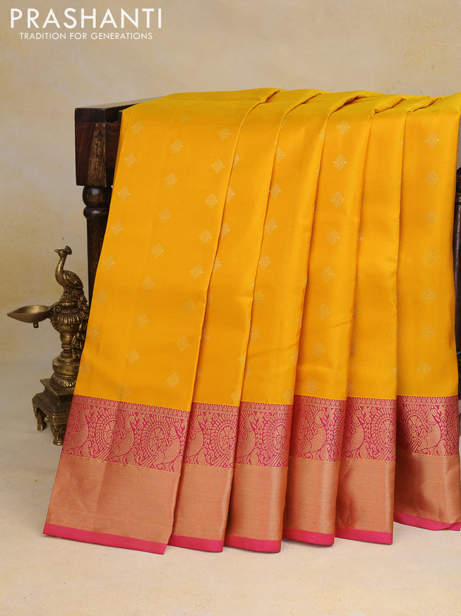 Pure kanchipuram silk saree mango yellow and pink with allover zari woven buttas and annam zari woven border