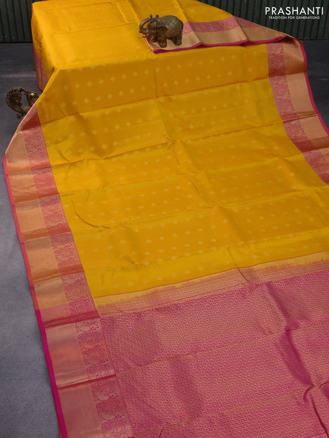 Pure kanchipuram silk saree mango yellow and pink with allover zari woven buttas and annam zari woven border