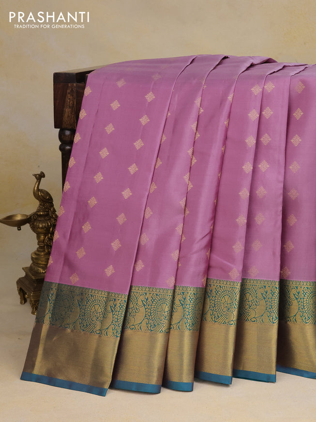 Pure kanchipuram silk saree lavender shade and teal green with allover zari woven buttas and annam zari woven border