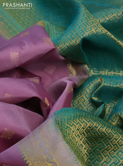 Pure kanchipuram silk saree lavender shade and teal green with allover zari woven buttas and annam zari woven border