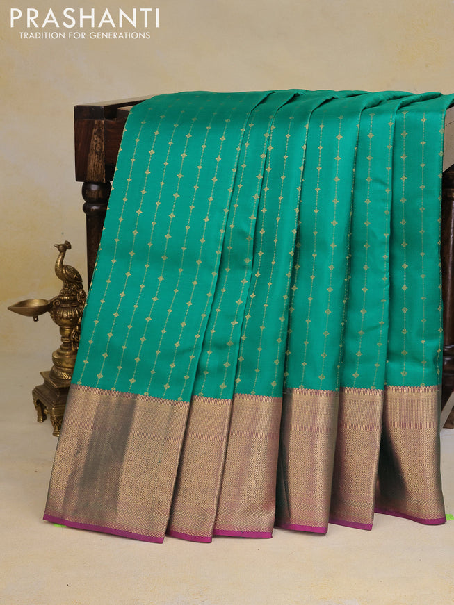 Pure kanchipuram silk saree green and pink with allover zari weaves and zari woven border