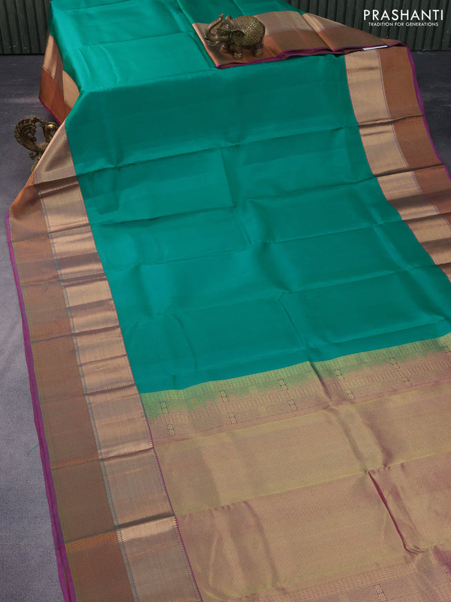 Pure kanchipuram silk saree green and pink with plain body and thread & zari woven border