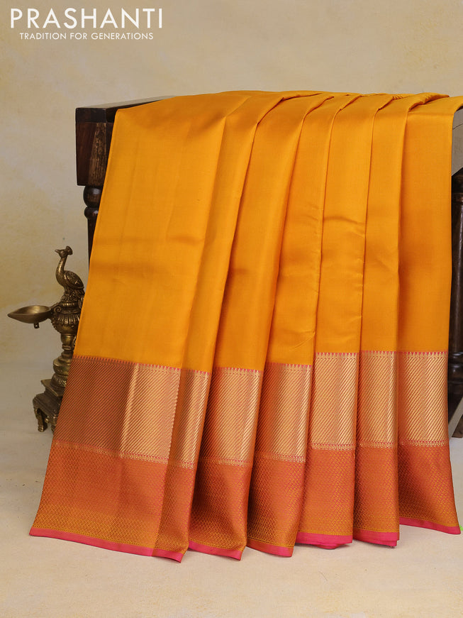 Pure kanchipuram silk saree mustard yellow and pink with plain body and thread & zari woven border