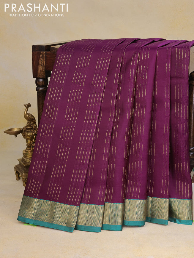 Pure kanchipuram silk saree deep purple and teal green with allover zari weaves and zari woven border